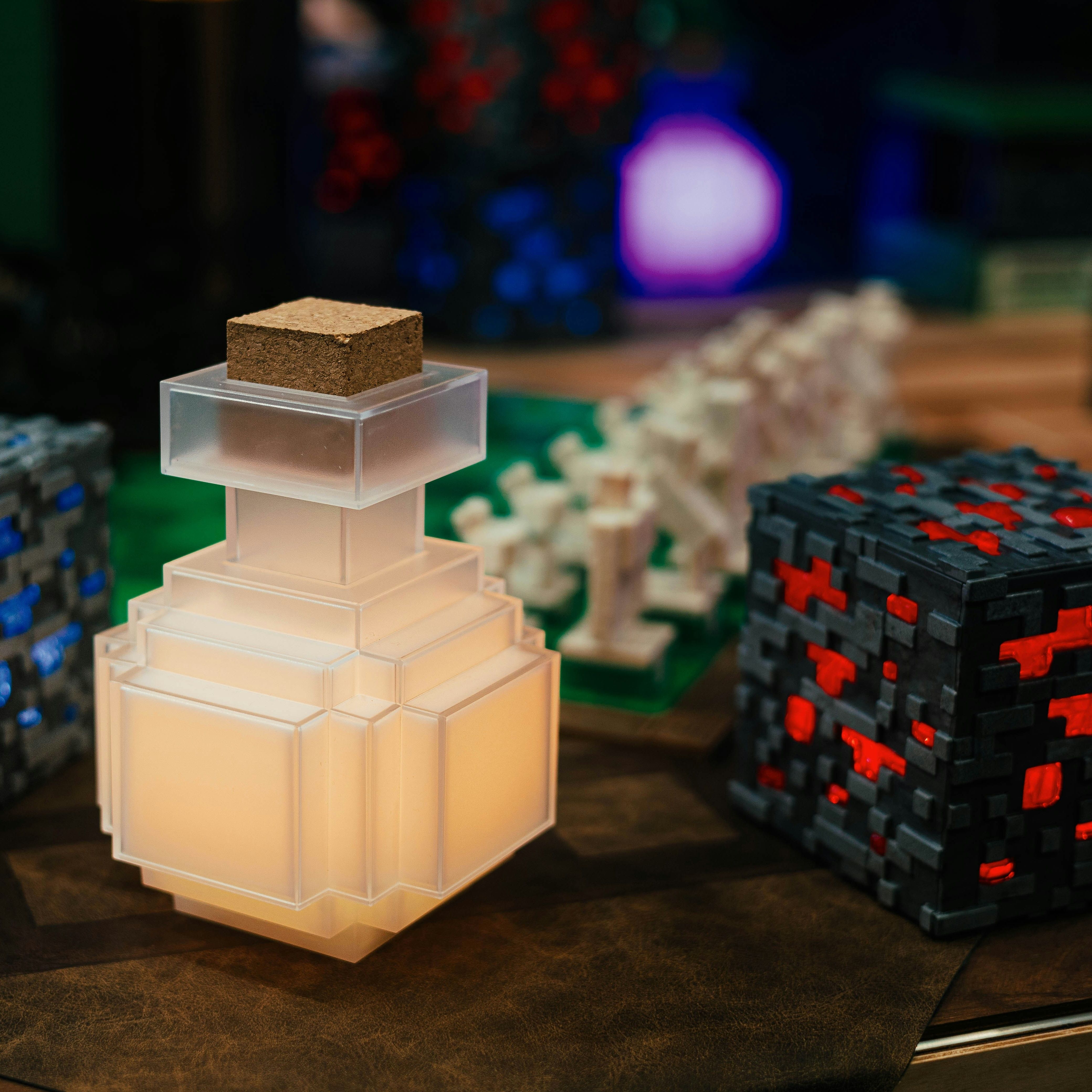 Minecraft-style items on a desktop, Photo by Connor Gan on Unsplash